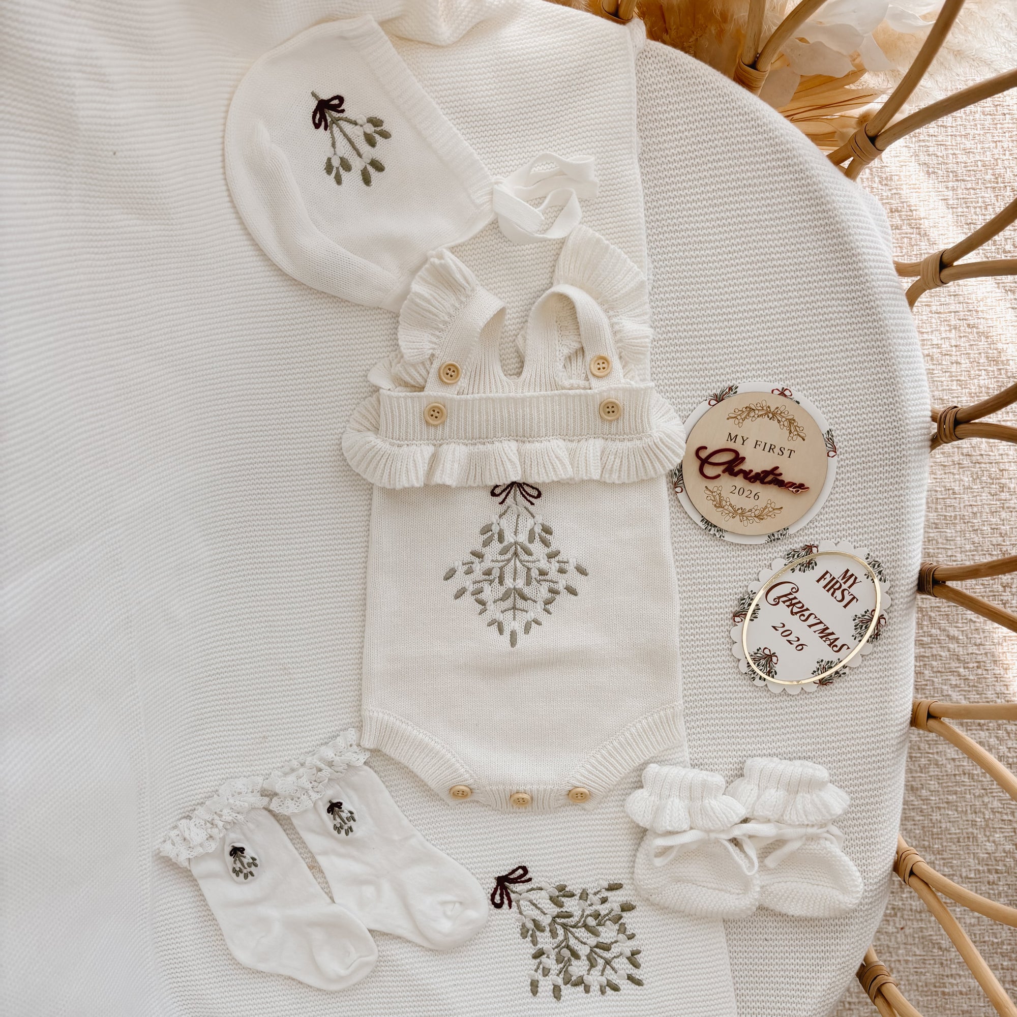 Mistletoe embroidered knit baby romper, bonnet, frill socks, booties and My First Christmas discs