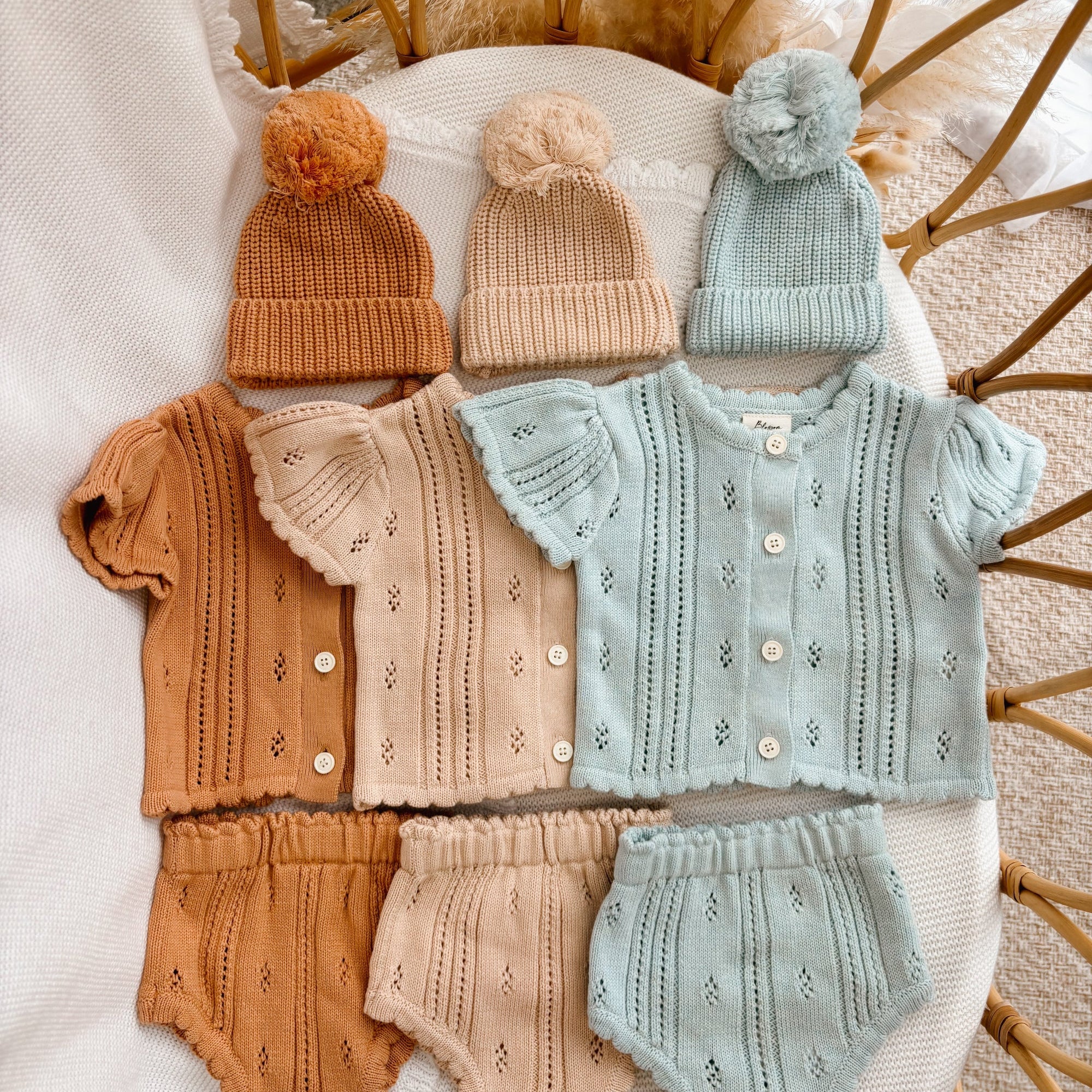 Margot Button Up Shortie Sets in Pumpkin, Vanilla Oat and Periwinkle Blue with matching pom beanies